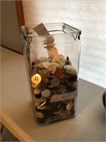 Glass container of buttons