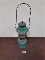 Vintage Coleman lantern with fuel