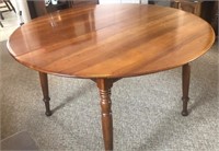 Solid Cherry round dining table, 1 leaf