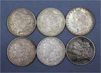 (6) O-Mint Morgan Silver Dollars