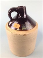 Stoneware jug with chip on the side
