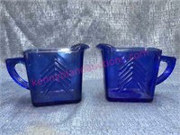 Pair cobalt blue pitchers