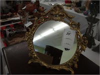 Small TOC rococco brass vanity mirror