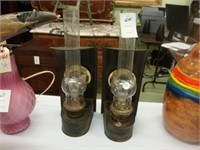 Two kerosene wall lanterns.