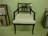 Baker caned seat black tole arm chair.