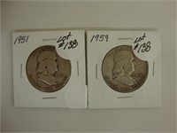 Two Franklin silver half dollars.
