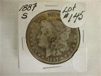 1887 S Morgan silver dollar.