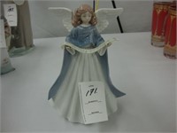 Lladro figurine of an angel with blue cape.