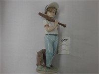 Lladro figurine of a young boy with a baseball