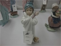 Lladro figurine of a young girl in a bathrobe and