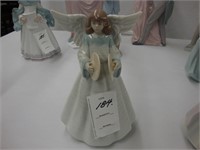 Lladro figure of an angel holding Cymbals