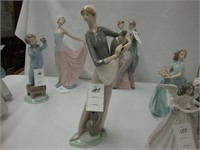 Larger Lladro figure of a woman in a tan dress