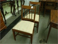 Pair of inlaid mahogany side chairs, ca 1850.