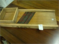 Antique wooden kraut cutter.