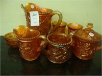 Lot of marigold carnival glass in Open Rose