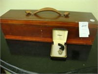 Box containing an old woman's wristwatch.