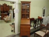 Narrow walnut bureau bookcase by Baker Furniture.