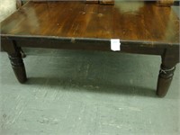 Large square pine coffee table.