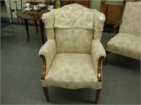 Straight leg Chippendale wingback arm chair.