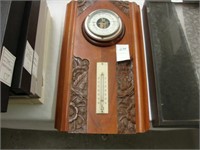 Art Deco mahogany carved barometer.