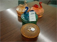 Three swan carnival powder jars along with