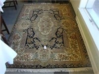Contemporary 5ft x 7ft high end floral wool rug.