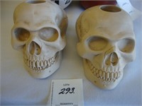Pair of Fashion victim skull candle holders.