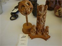 Four pieces of carved wooden ware.