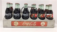 12 coke bottles in Very Unusual 12 Bottle Alum.