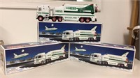 3 1999 Hess toy trucks and space shuttle with