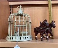 Cast iron horses and birdcage