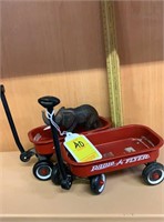 Two miniature Radio Flyer wagons with elephant