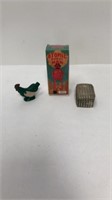 Vintage toys: robot, chicken, and metal basket