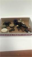 Box of little collectible hats and shoes