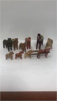 10 wooden painted horses - some made in Sweden.