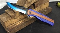 Blue plastic with wood grain knife
