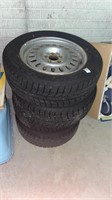 Set of 4 Bridgestone Blizzak winter tires on 5