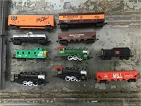 Big lot of Maisto locomotives, cars & track