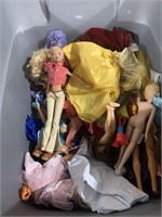 Box full dolls and accessories
