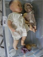 2 Vintage Sleepy-Eye Dolls in a tote