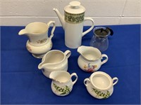 Tea Pot , and Small Pitchers