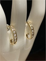 Genuine diamond and gold pierced earrings. Total