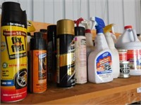 shelf full of automotive use liquids
