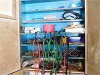 metal wall cabinet w/ automotive items,