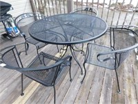 metal patio table w/4 arm chairs