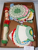 FLAT BOX OF HAND CROCHETED DOILES AND HOT PADS