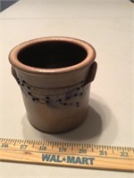 Small clay pot appears unmarked