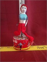 Dancing girl wind-up tin toy