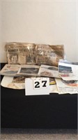 Lot of Kennedy obituary newspapers and car print