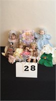 Lot of 7 dolls w/ accessories